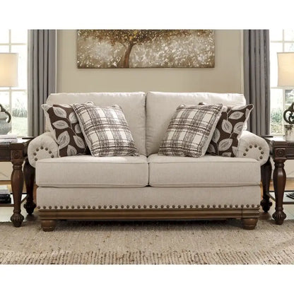 Divanetto tradizionale marrone grano con borchie decorative