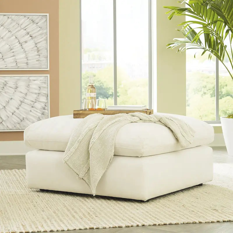 Pouf accentato in similpelle nabuk oversize con cuscino in piuma sintetica