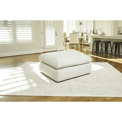 Pouf accentato in similpelle nabuk oversize con cuscino in piuma sintetica