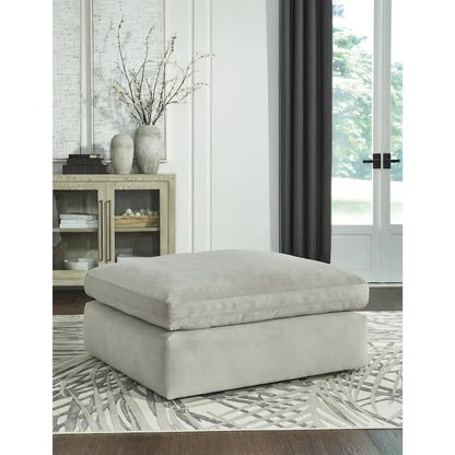 Pouf accentato in similpelle nabuk oversize con cuscino in piuma sintetica