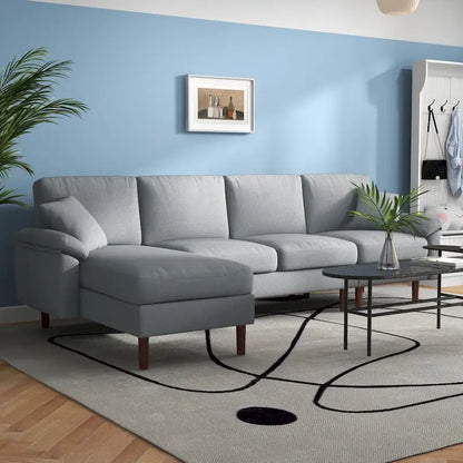 Divano sezionale a L con chaise longue reversibile, tessuto in lino e gambe in legno