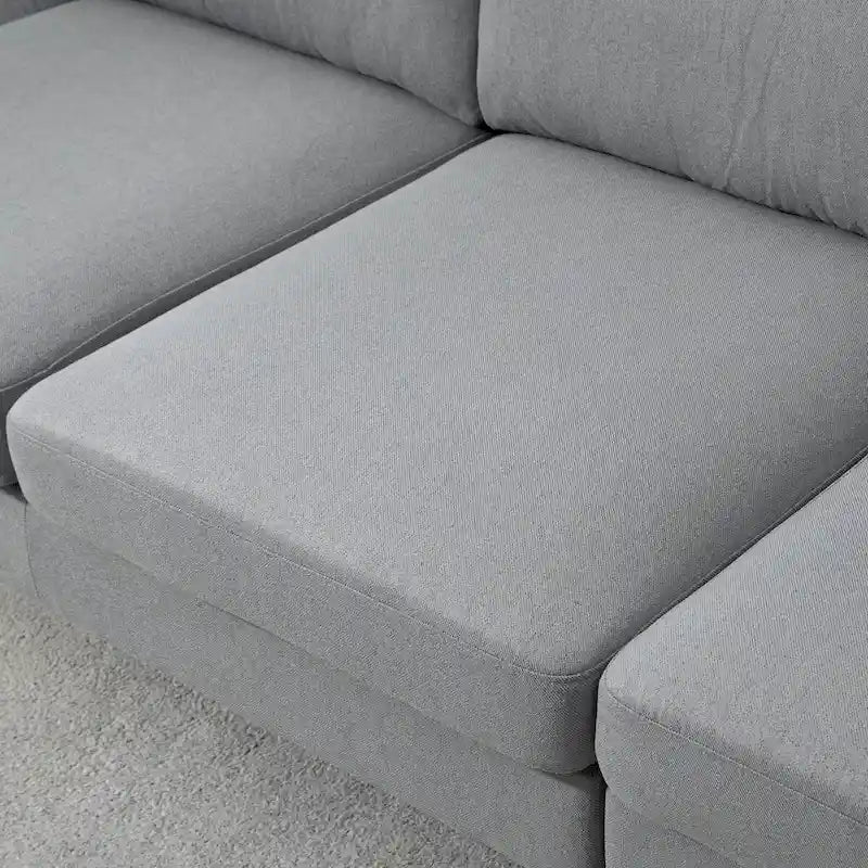 Divano sezionale a L con chaise longue reversibile, tessuto in lino e gambe in legno